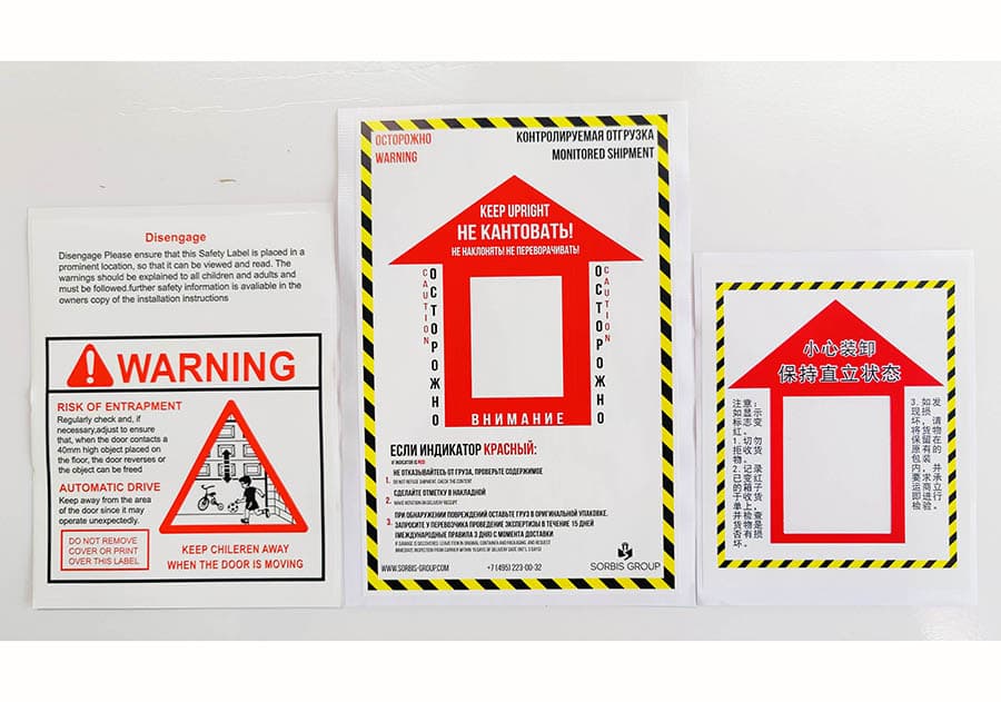 Large format safety and warning labels — multilingual print production